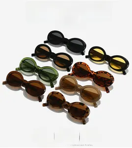 Matrix display of vintage oval sunglasses in various colors with polished finish