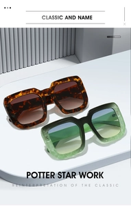 Detail of square oversized sunglasses with tortoiseshell and gradient frames on a display