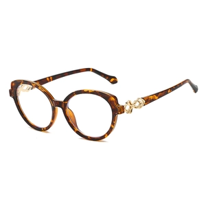 Chic tortoiseshell cat eye sunglasses with gold metal accents on a clean white background