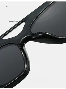 Detail of comfortable integrated nose pads on black double bridge sunglasses