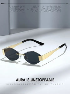 Detail of rimless diamond-cut lenses and golden metal temples on modern sunglasses