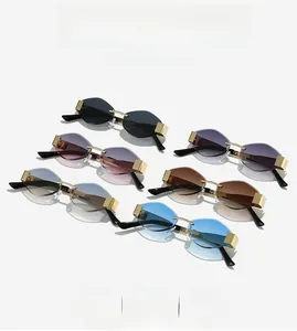 Multiple colors of rimless geometric sunglasses with metal bridges on white background