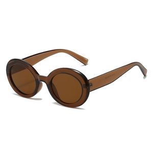 Retro oval tea-colored sunglasses with wide temples and UV protection for a stylish look