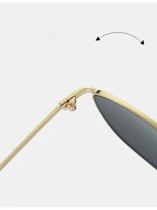 Macro shot of durable metal hinges on cat eye sunglasses with glossy gold finish