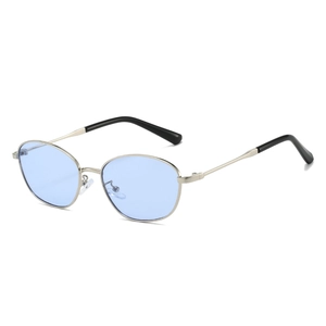 Vintage cat eye sunglasses with silver metal frame and light blue translucent lenses