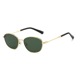 Retro cat eye metal frame sunglasses with dark green lenses and golden finish