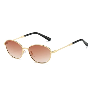 Cat eye sunglasses with golden metal frame and brown gradient lenses for UV protection
