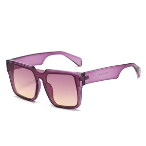 Fashionable oversized square sunglasses with translucent purple frame and gradient lenses
