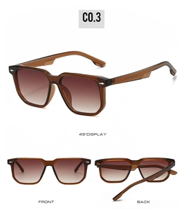 Detail view of square tortoiseshell sunglasses with metal rivets and gradient lenses
