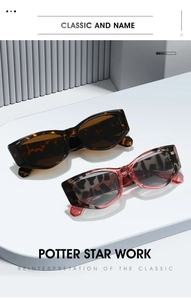 Détail de lunettes de soleil polygonales à monture épaisse en motifs écailles de tortue