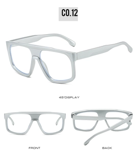 Three perspectives of flat top silver oversized sunglasses with matte metallic finish