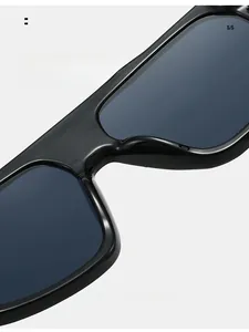 Close-up of integrated nose pads on glossy black futuristic sunglasses for comfort