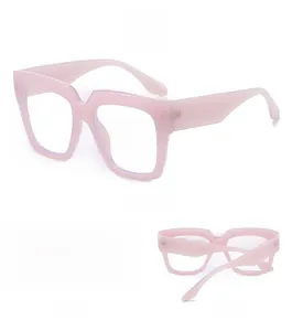 Three-angle views of large square pink blue light blocking glasses with transparent frames