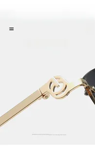 Detail of gold metal temples featuring a G-shaped hollow cutout hinge on frameless sunglasses