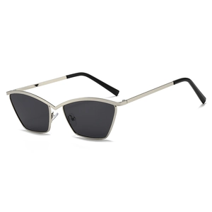 Fashionable metal cat-eye sunglasses with silver frame and dark grey lenses on white background