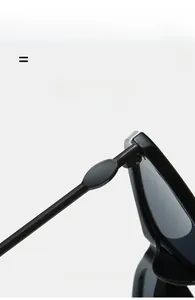 Detailed macro view of the ultra-light flexible hinge on cat-eye sunglasses frames