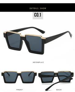 Detail view of square half-frame sunglasses with golden metal trim and grey lenses