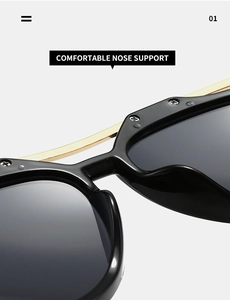Close-up of comfortable integrated nose support on black Y2K sunglasses with gold metal accents
