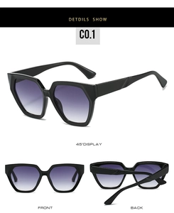 Macro view of polygon oversized sunglasses with black frame and purple gradient lenses