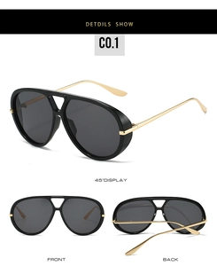 Detail view of large pilot sunglasses with retro double bridge and golden metal temples