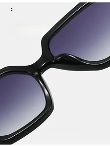 Detail of integrated high nose pads on stylish black gradient oversized sunglasses