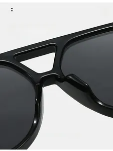 Close-up of comfortable integrated nose pads on black double-bridge sunglasses
