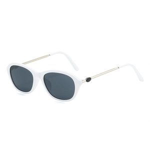 Vintage white cat-eye sunglasses with gold metal temples and dark lenses for women