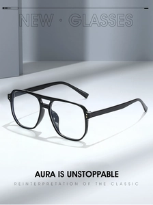 Detail of square black aviator glasses with double bridge and gold rivet accents