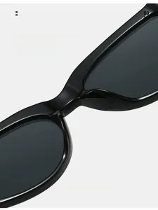Detail of comfortable integrated nose pads on black cat-eye sunglasses for outdoor sun protection