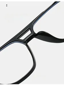 Detail of integrated non-slip nose pads on glossy black square frame glasses