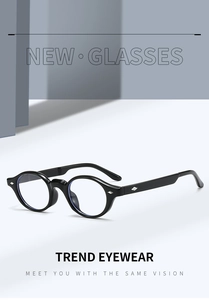 Detail of glossy black TR90 round frame glasses featuring silver diamond-shaped rivets