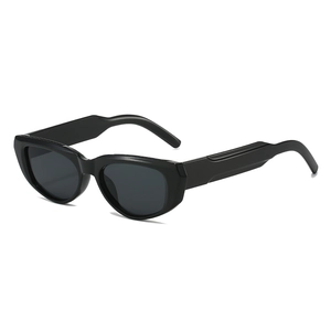 Modern thick-frame black cat-eye sunglasses for men and women, shown in a 45-degree angle