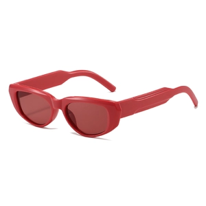 Retro cat eye sunglasses with narrow red frames and stylish tinted lenses for outdoor fashion