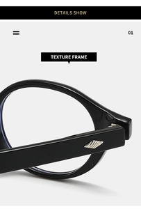 Close-up of black TR90 glasses frame showing silver wing-shaped metal hinge detail