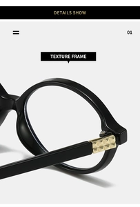 Detail shot of golden textured metal hinge on black oval frame glasses with pyramid pattern