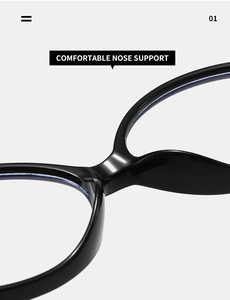 Detail of comfortable integrated nose support on black oval glasses frame