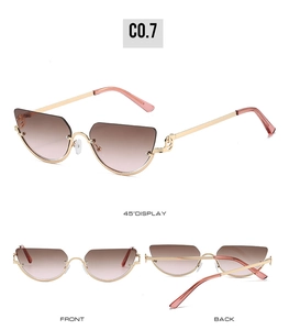 Detailed views of gold metal cat-eye sunglasses with gradient lenses and pink tips
