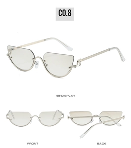 Three-way view of frameless cat eye sunglasses with silver metal frame and ring details