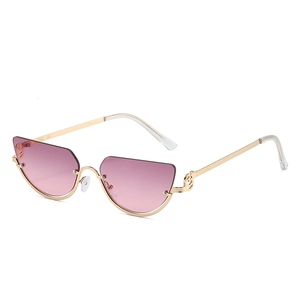 Chic cat-eye metal sunglasses with pink gradient lenses and golden frame details
