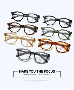 Classic oval blue light blocking glasses frames in seven diverse retro colors