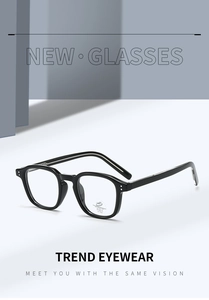 Detail of TR90 blue light blocking glasses featuring silver dot accents and black frames