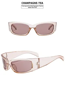 Dettaglio occhiali da sole sportivi cat-eye champagne con lenti color tè e montatura