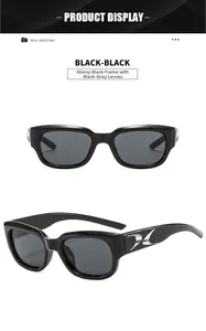 Detail of square black sunglasses featuring streamlined silver metal accents on temples