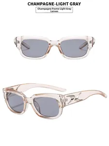 Detail of champagne square sunglasses with light gray lenses and silver metal temple accents