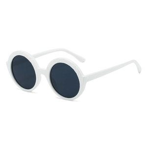 White round frame sunglasses with stylish wavy textured edges and dark UV-protective lenses