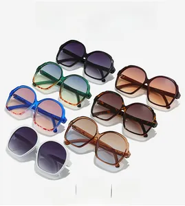 Collection of seven oversized oval sunglasses with rhinestones in various trendy colors