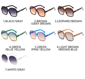 Showcase of seven oval oversized rhinestone sunglasses in diverse gradient color options