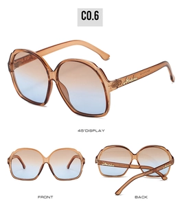Detail view of oval sunglasses with crystal accents and gradient lenses from multiple angles