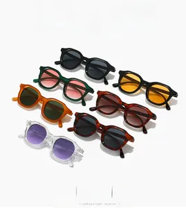 Detailed grid of oval vintage sunglasses in seven various frame colors and tinted lenses