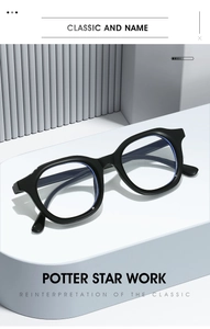 Détail de lunettes ovales vintage anti-lumière bleue sur un support géométrique blanc